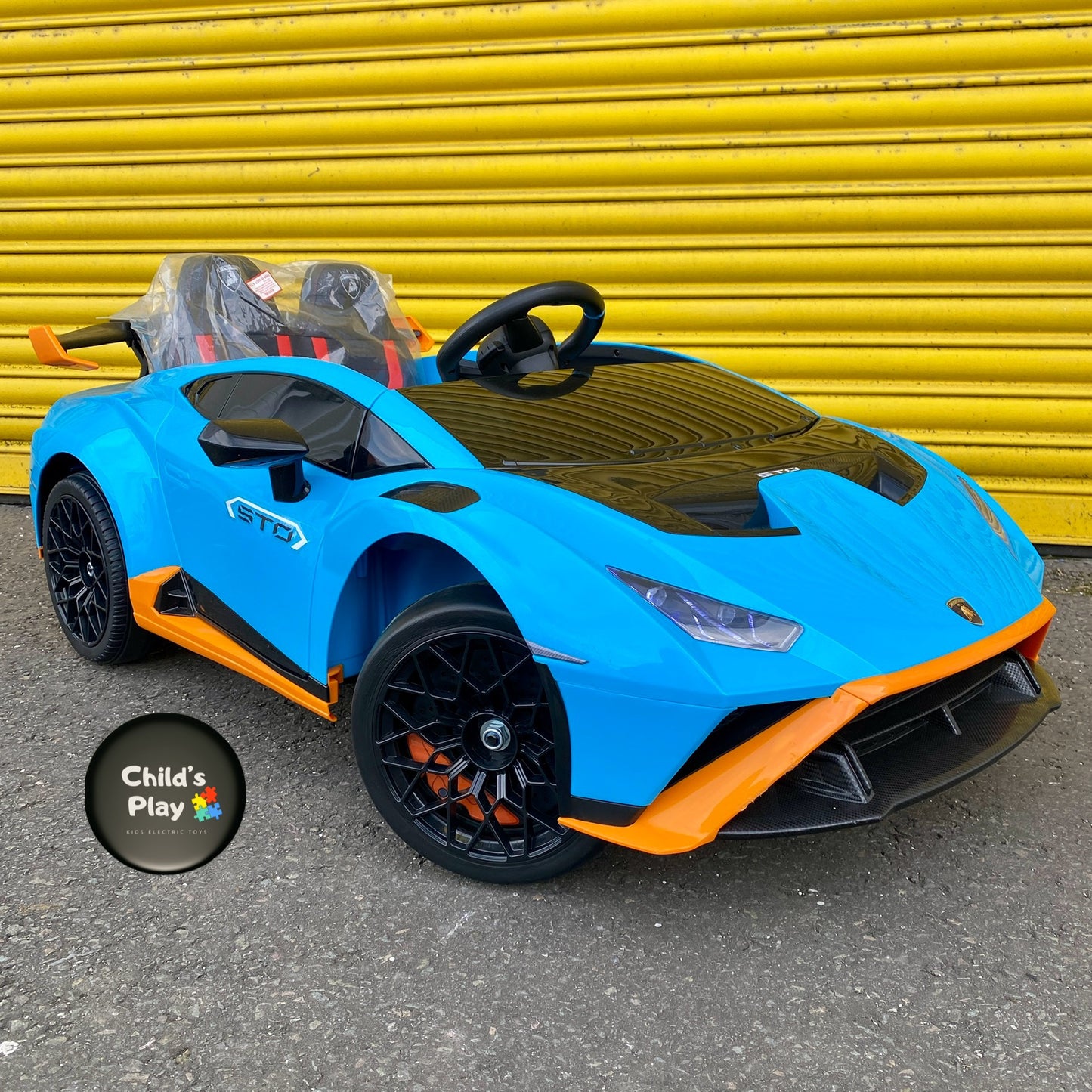 Licensed Lamborghini Huracan STO 24v DRIFT MODE Kids Electric Ride on Car- BLUE FASTEST RIDE ON CAR ON MARKET!