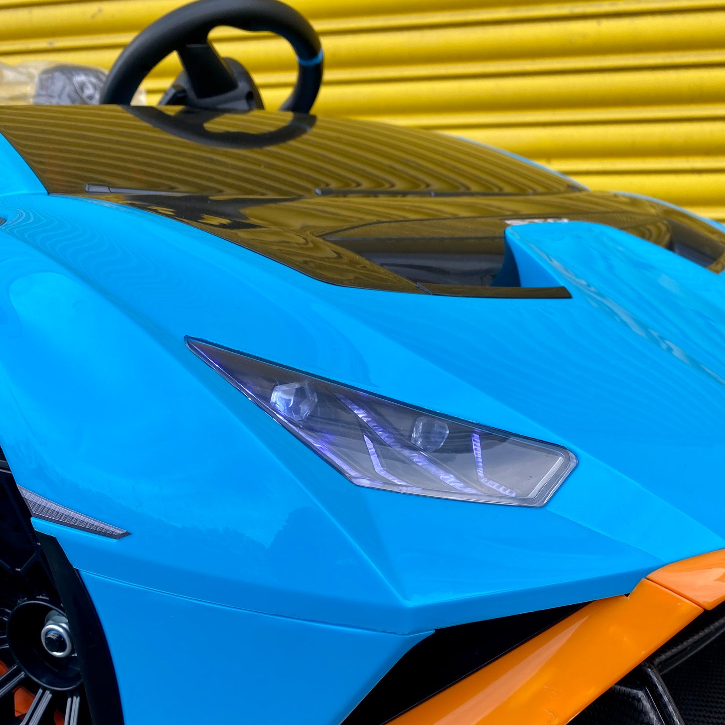 Licensed Lamborghini Huracan STO 24v DRIFT MODE Kids Electric Ride on Car- BLUE FASTEST RIDE ON CAR ON MARKET!