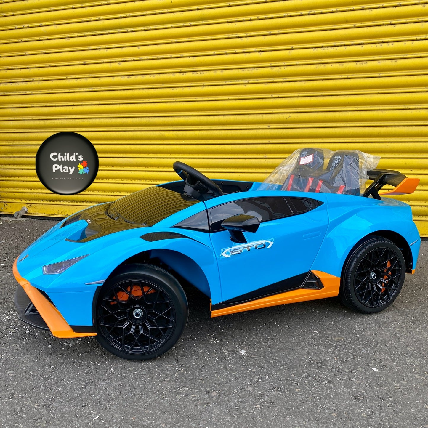 Licensed Lamborghini Huracan STO 24v DRIFT MODE Kids Electric Ride on Car- BLUE FASTEST RIDE ON CAR ON MARKET!