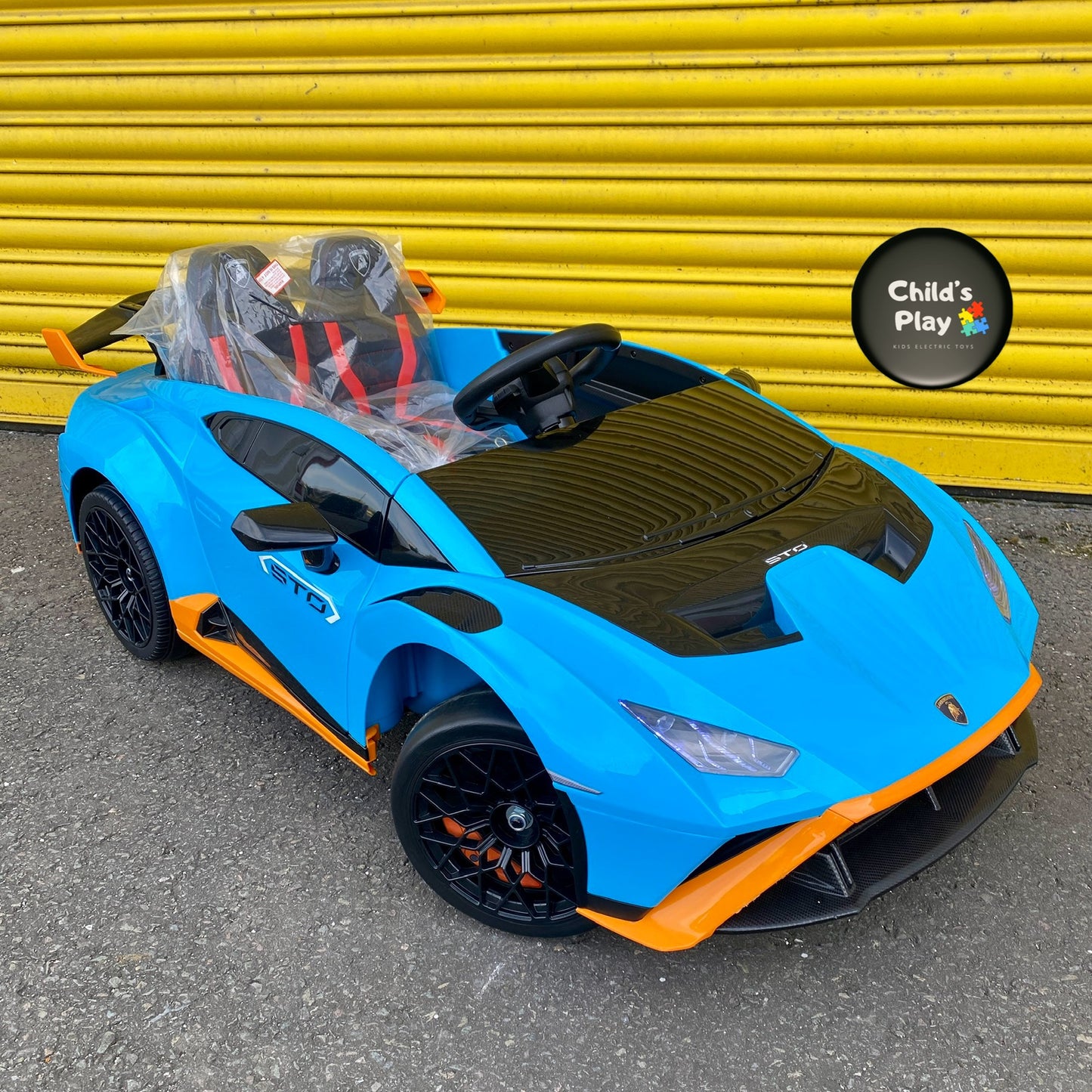 Licensed Lamborghini Huracan STO 24v DRIFT MODE Kids Electric Ride on Car- BLUE FASTEST RIDE ON CAR ON MARKET!